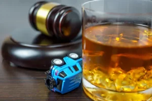 Whiskey, Gavel, and Toy Car