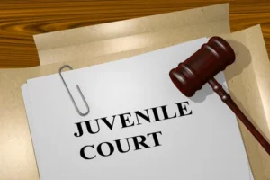 Image of a San Antonio Juvenile Defense Lawyer discussing a case in juvenile court, emphasizing juvenile justice system and juvenile offenses for young people.