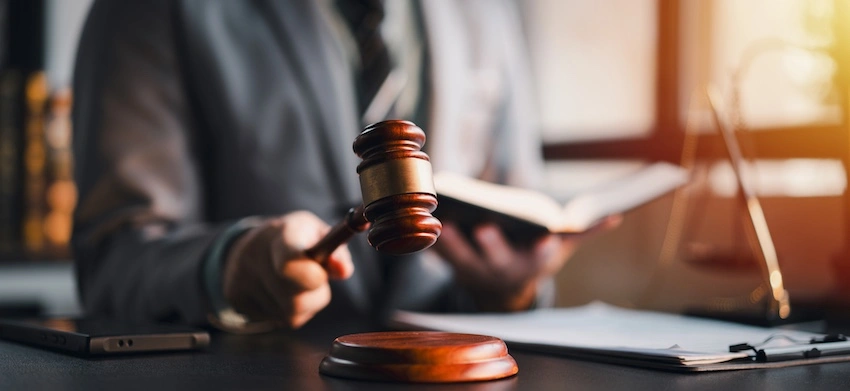 A Waco criminal defense lawyer is working at his desk.