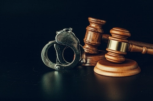 Handcuffs symbolizing felony DWI arrest and prison consequences in Texas